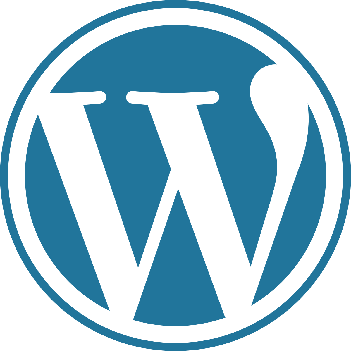 WordPress blue logo.svg 5cc7eab56e813